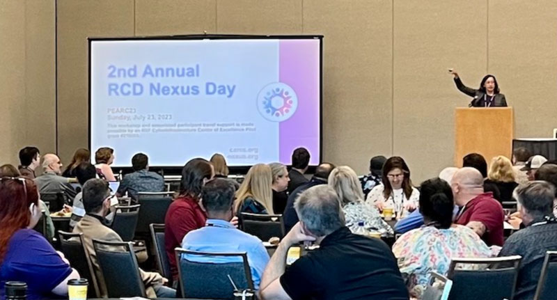 A woman presenting at the 2nd annual RCD Nexus Day